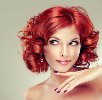 girl with short curly red hair